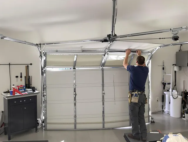 Jurupa Valley Garage Door Repair specialist performing precise section replacement on Jurupa Valley garage door