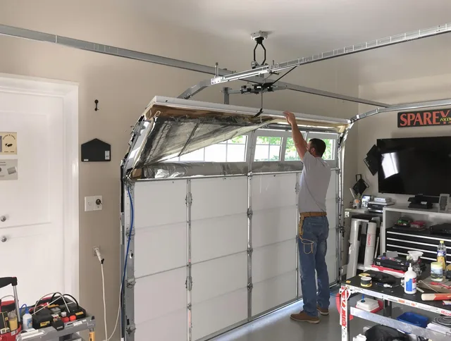 Garage door section replacement by Jurupa Valley Garage Door Repair in Jurupa Valley